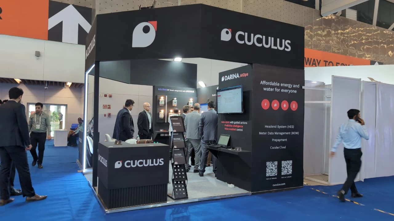 The Cuculus exhibition booth showing product displays, screens and an affordable-energy tagline.